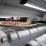 This New Robotic pizza-making machine can churn out 300 pies an hour- Details inside