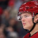 Canadian Barrett Hayton apologized for keeping his helmet on during the Russian national Anthem
