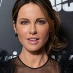Kate Beckinsale effectively changes minds in dark hued outfit with a diving neck area